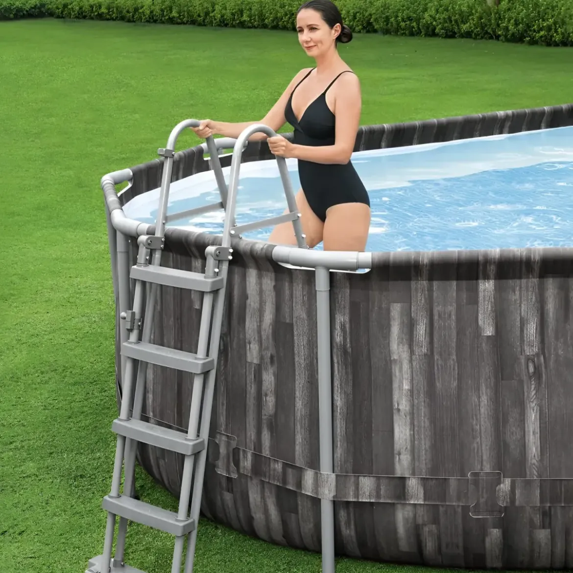 Piscina Ovale 610x366x122 cm Effetto Legno con Pompa Filtro e Accessori